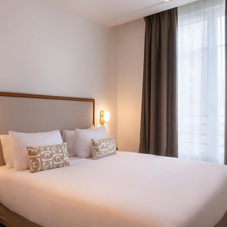 Le Lampika Hotel Paris Værelse billede