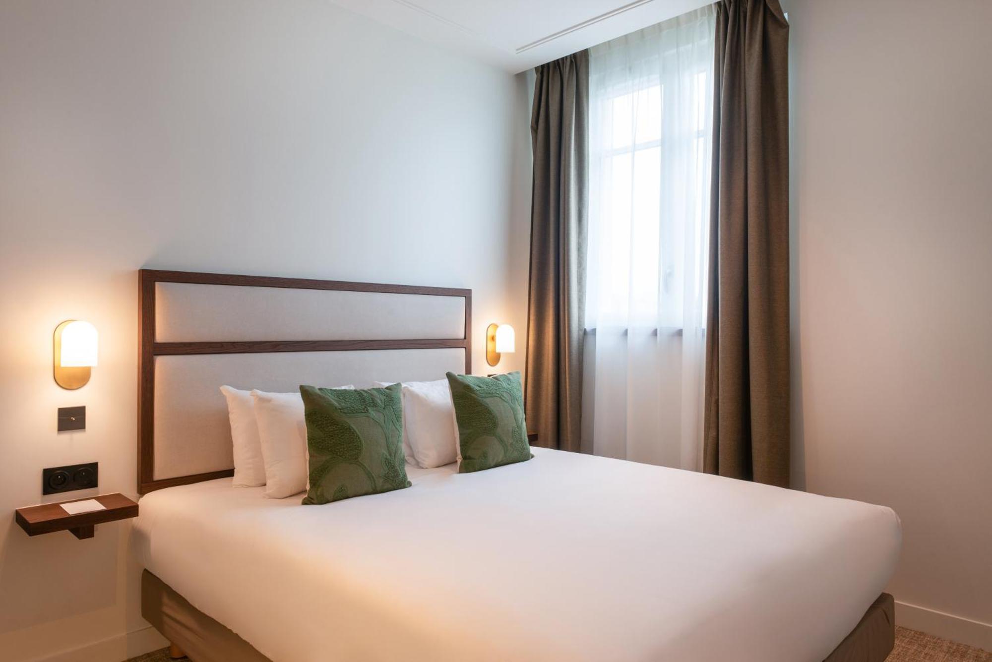 Le Lampika Hotel Paris Værelse billede