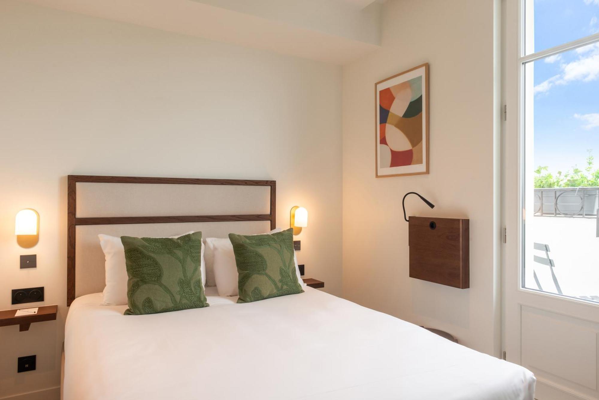 Le Lampika Hotel Paris Værelse billede