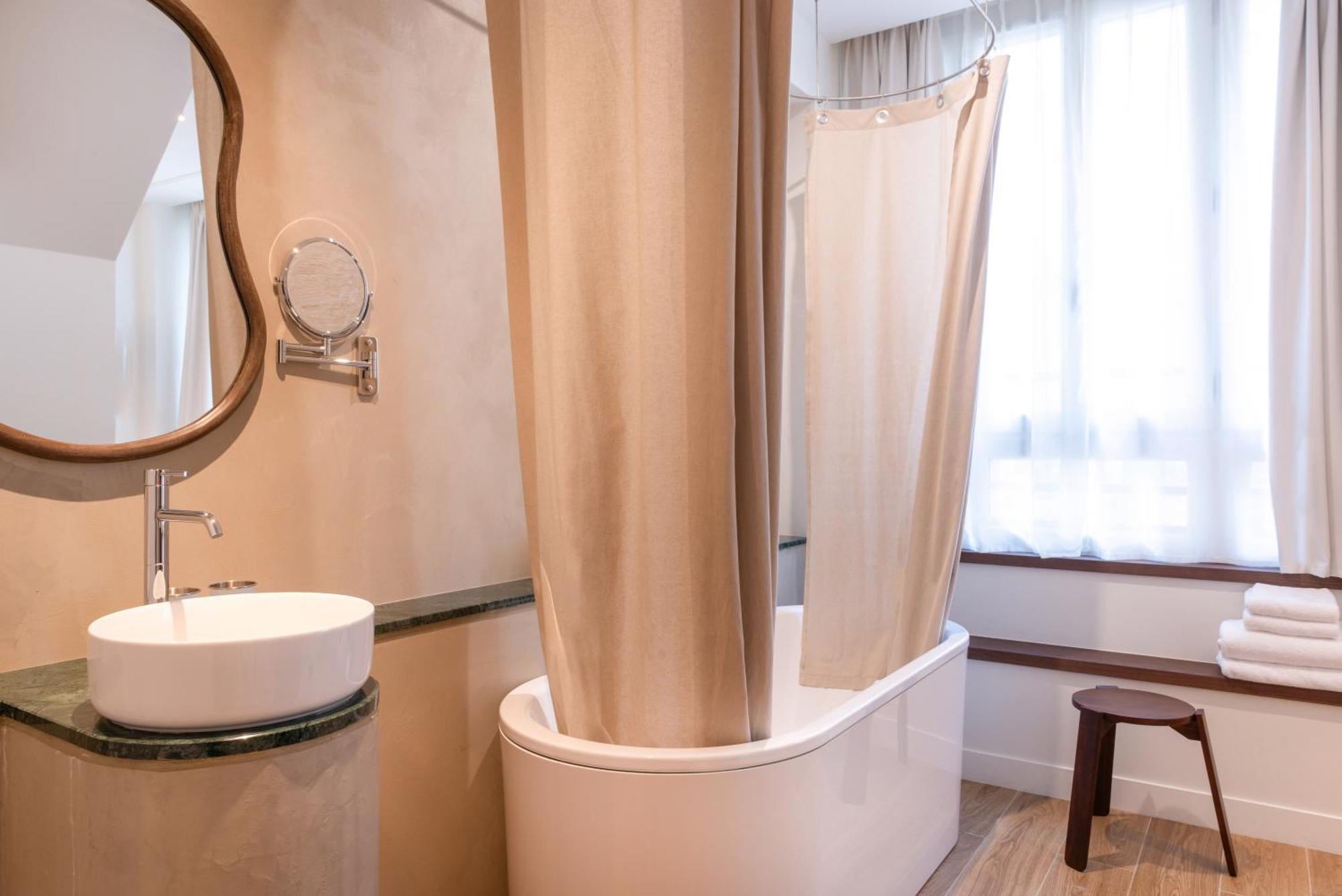 Le Lampika Hotel Paris Værelse billede