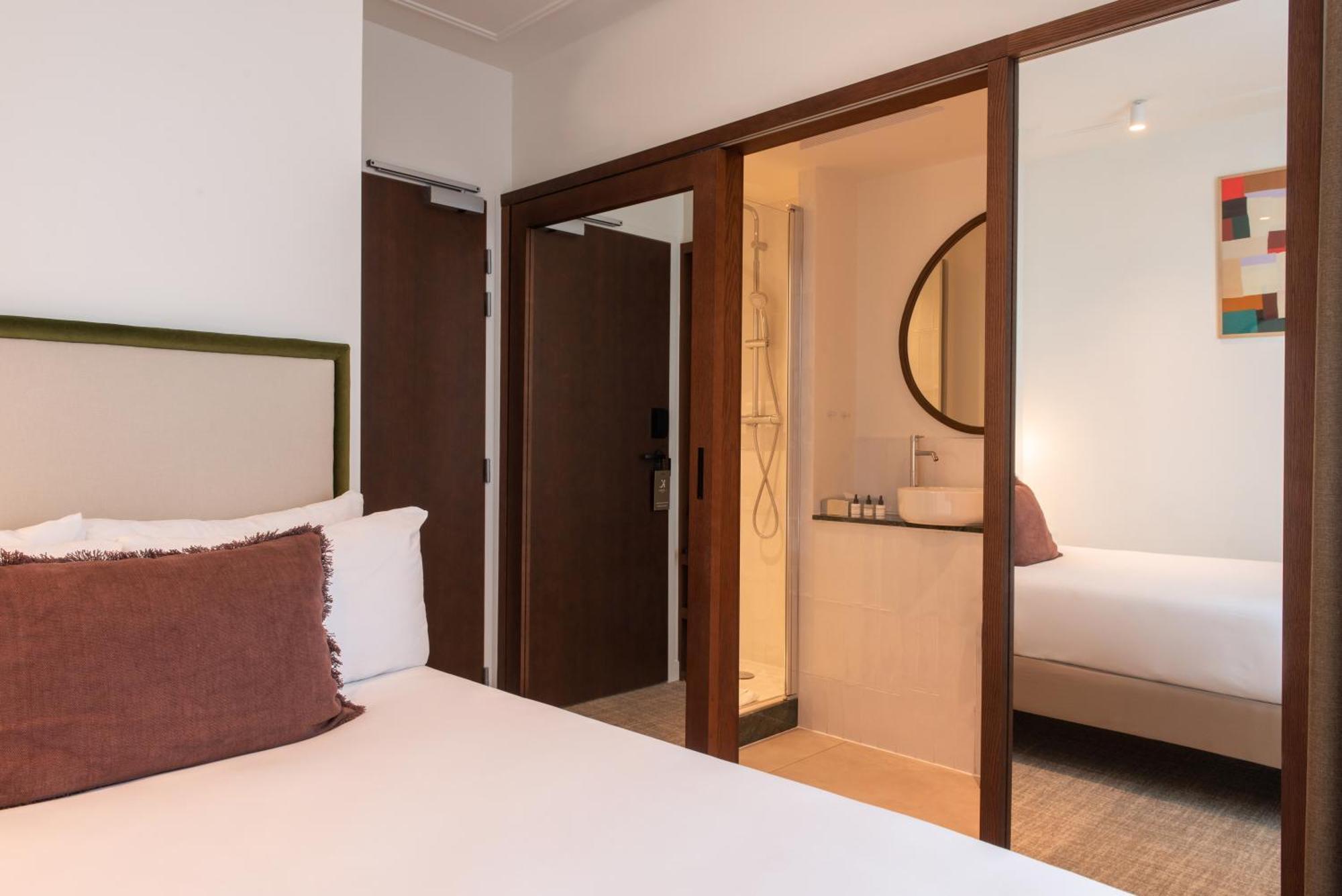 Le Lampika Hotel Paris Værelse billede