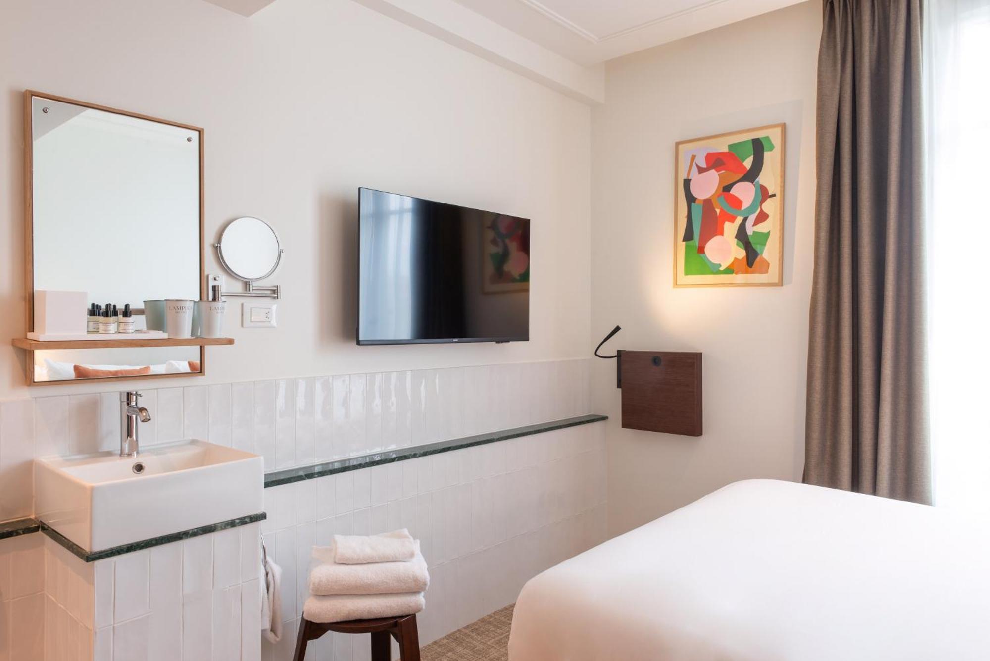 Le Lampika Hotel Paris Værelse billede