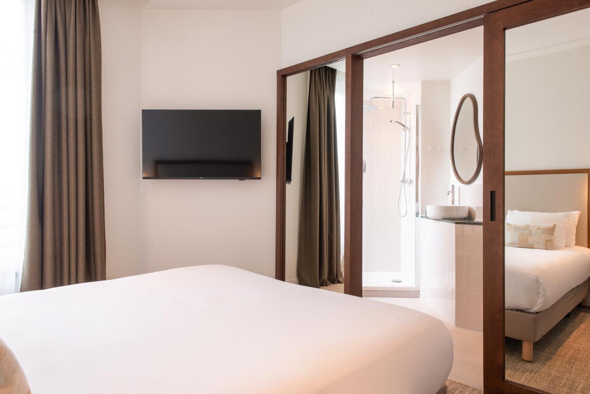 Le Lampika Hotel Paris Værelse billede