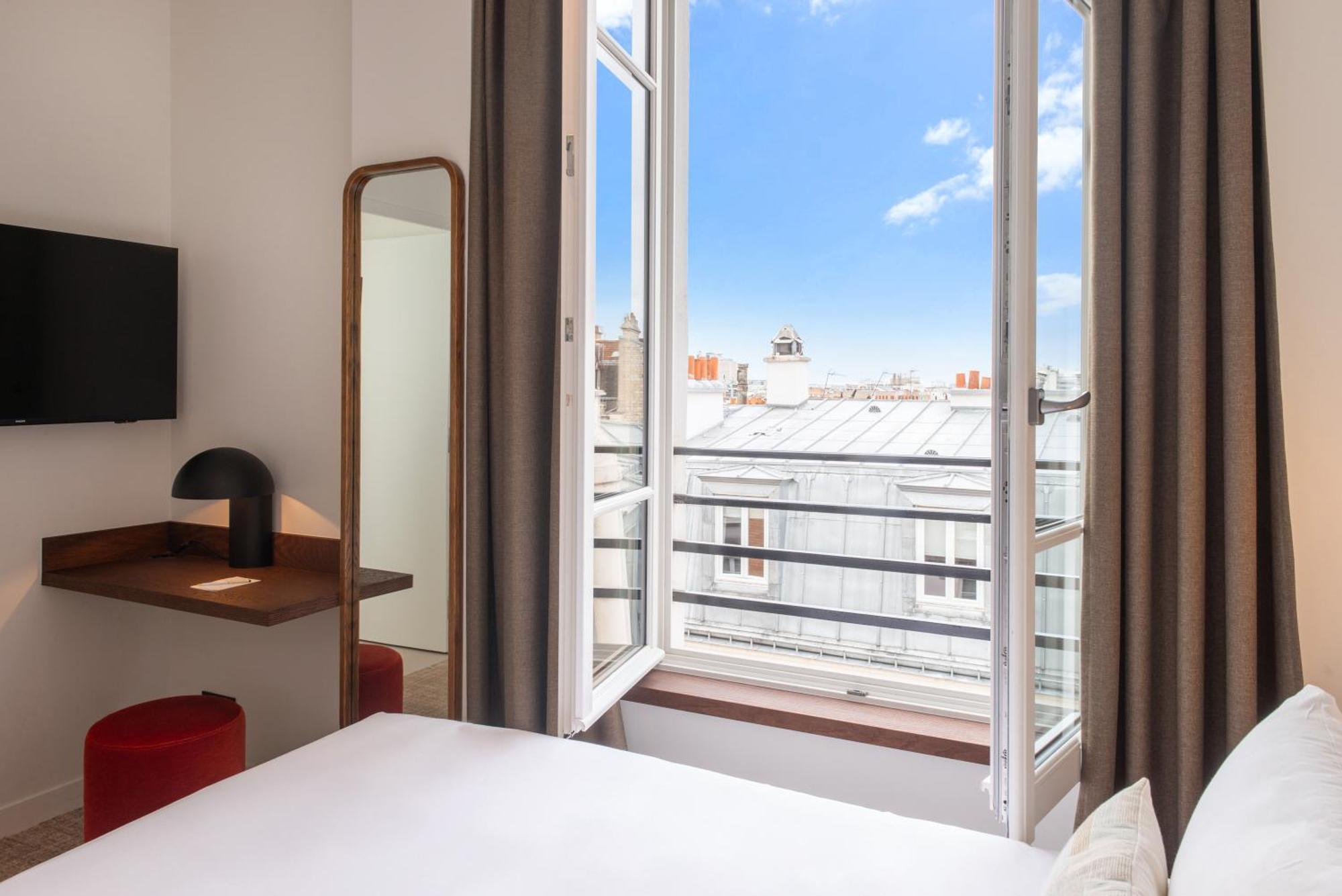 Le Lampika Hotel Paris Værelse billede